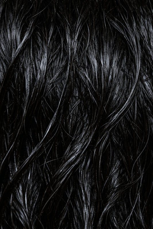 close up of greasy, oily black hair