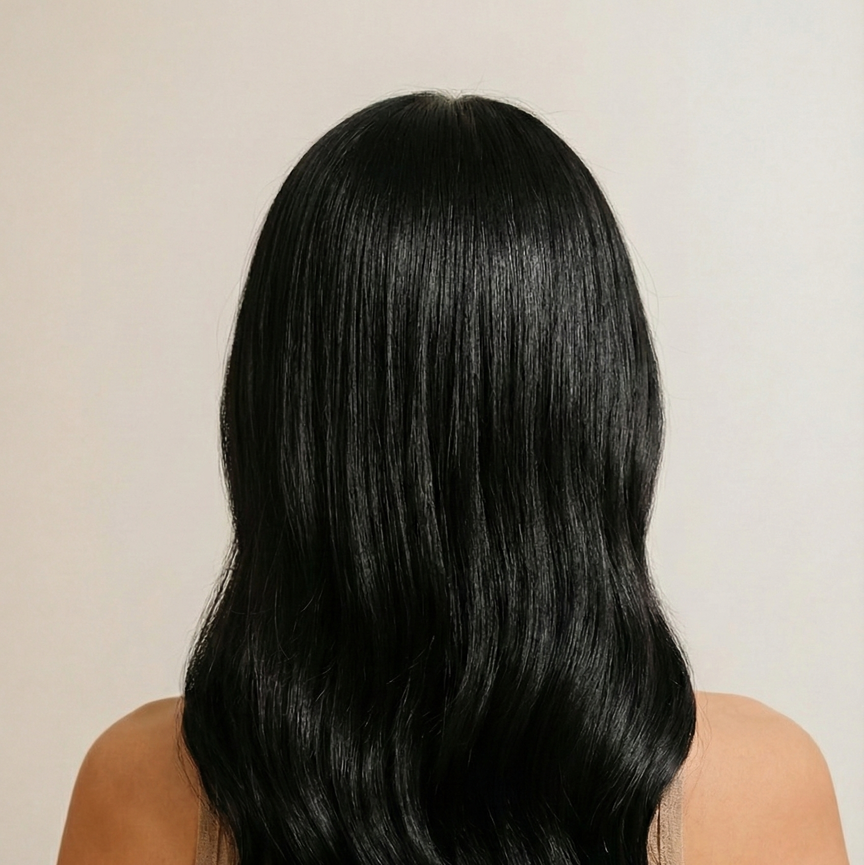 shiny and frizz free hair showing the after look of using golden amara hair oil